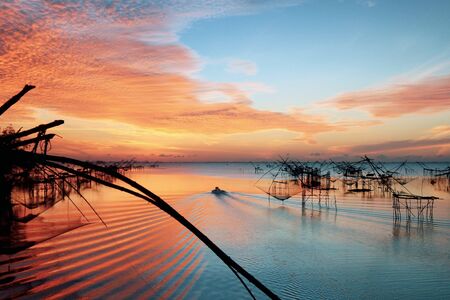 Beautyful sunrise at Pakpra PhatthalungThailandの写真素材