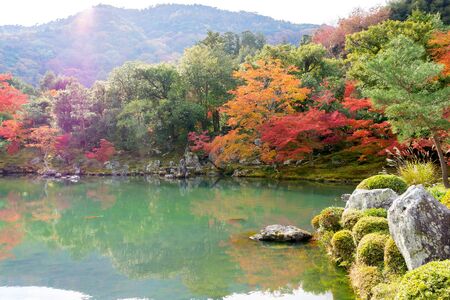 Kyoto, Japan- November 20,2014 : Colorful of autumn leaves with reflection in pond at Tenryo-ji Temple , Arashiyama, Kyoto, Japanのeditorial素材
