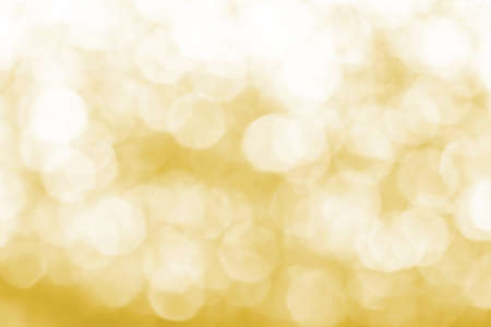 Yellow gold  bokeh light backgroundの写真素材