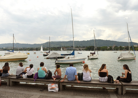Zurich, Switzerland - June 03, 2017: People on quay Lake Zurich. Daily life in Zurich.のeditorial素材