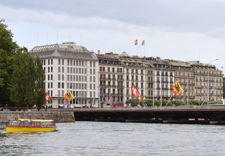 Geneva, Switzerland - June 05, 2017: Buildings with offices of famous brands in the center of Geneva city.のeditorial素材