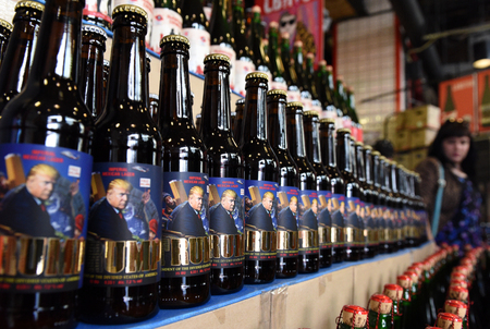 Lviv, Ukraine - May 20, 2017: A bottles of beer featuring US President Donald Trump  called "Trump" and written "President of Devided States of America"
brewed in "Pravda" beer restaurant in Lviv.のeditorial素材