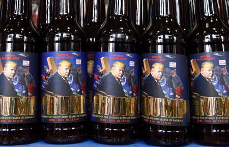 Lviv, Ukraine - May 20, 2017: A bottles of beer featuring US President Donald Trump  called "Trump" and written "President of Devided States of America"
brewed in "Pravda" beer restaurant in Lviv.のeditorial素材
