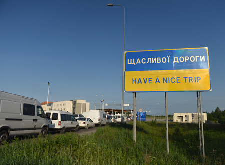 Hrushiv, Ukraine - May 31, 2017: Sign 'Have a nice trip" in Hrushiv-Budomezh checkpoint on the border with Ukraine and Poland some 60kms from city of Lviv.のeditorial素材