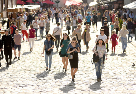 Lviv, Ukraine - May 2017: Crowds of tourists on Rynok Square (Market Square) in Lviv, Ukraine.のeditorial素材