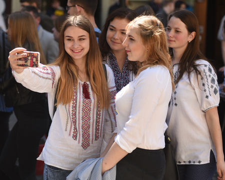 LVIV, UKRAINE - MAY 18, 2017: People wearing Vyshyvanka,(traditional Ukrainian embroidered blouses), during world celebration Vyshyvanka Day in Lviv, Ukraine.のeditorial素材