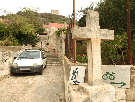 Lastovo, Croatia - August 2017: Tourist signs on street of the Lastovo old town.のeditorial素材