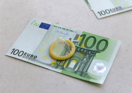 one hundred euro and condomの写真素材