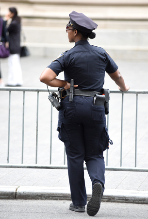 NEW YORK, USA - June 10, 2018: The New York City Police Department (NYPD) police officer performing...