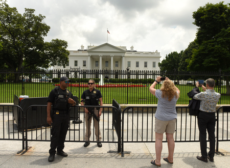Washington, DC - June 02, 2018: Tourists and Secret Service guard near The White House, Washington DC.のeditorial素材
