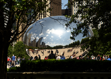 Chicago, USA - June 05, 2018: People near the Cloud Gate, a public sculpture by Anish Kapoor at Millennium Park. Cloud Gate, also known as the Bean one of Chicago's most famous attractions.のeditorial素材