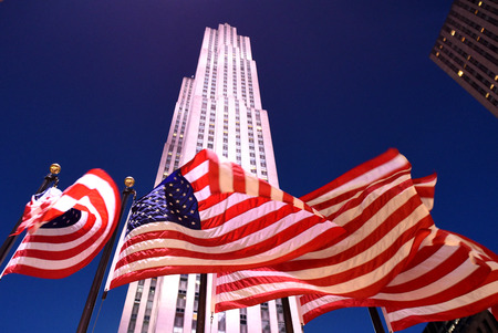 New York, USA - May 25, 2018: American flags near the Rockefeller Centenear in New York Cityのeditorial素材