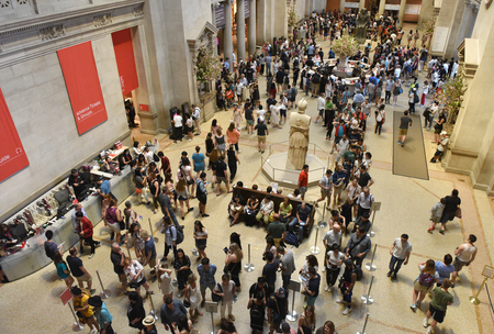 New York, USA - May 26, 2018: Crowd of people in Metropolitan Museum of Art in New York City.