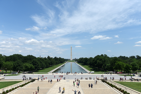 Washington, DC - June 01, 2018: People near the Lincoln Memorial Reflecting Pool and Washington Monument at the background in Washington DC, USAのeditorial素材