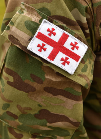 Georgian patch flag on soldiers arm. Georgia troopsの写真素材
