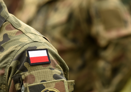 Polish patch flag on soldiers arm. Poland military uniform. Poland troopsの写真素材