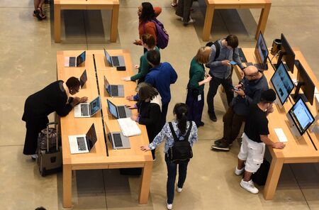 New York, USA - June 08, 2018: People in store Apple Fifth Avenue in New York, NY.のeditorial素材