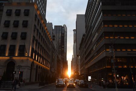 New York, USA - June 10, 2018: Cars on the streets of Manhattan in New York.The sun shines on the...