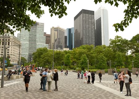 New York, USA - May 28, 2018: People on the Battery Place in lower Manhattan in New York.