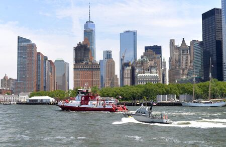 New York, USA - June 9, 2018: Fireboat of FDNY moving near the financial district in lower Manhattan, New York, USAのeditorial素材