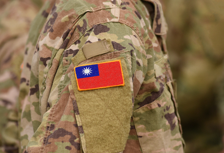 Flag of Taiwan on soldiers arm. Flag of Taiwan on military uniforms (collage).の写真素材