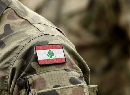 Flag of Lebanon on military uniform (collage).の写真素材