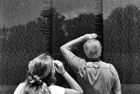Washington, DC - June 01, 2018: Visitors of the Vietnam War memorial in Washington.のeditorial素材