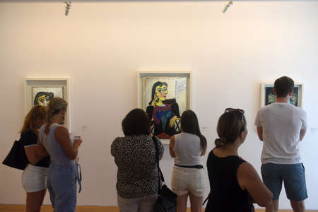 Paris, France - August 27, 2019: Visitors near the Portrait of Dora Maar 1937 by Pablo Picasso...