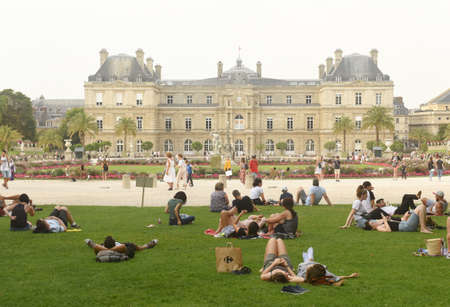Paris, France - August 27, 2019: A people resting on the lawn in Luxembourg Gardens in Paris.のeditorial素材