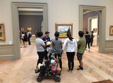 New York, USA - May 26, 2018: Visitors near the Vincent van Gogh painting in Metropolitan Museum of Art in New York City.のeditorial素材