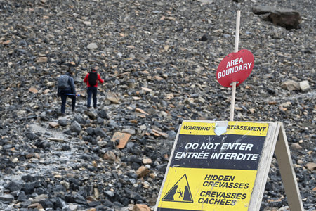 Banff National Park, Alberta, Canada - August 12, 2023: Warning sign near the Columbia Icefield in the Banff National Park.のeditorial素材