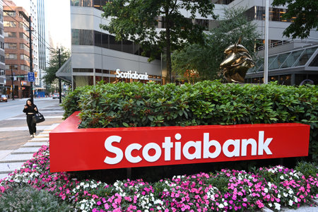 Vancouver, BC, Canada - August 16, 2023: A Woman goes near the Scotiabank in downtown of Vancouver.のeditorial素材