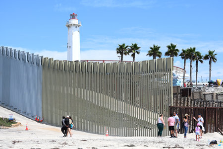 Border Field State Park Beach, CA, USA - July 30, 2023: The USA Mexico Border Wall near Friendship Park and Tijuana Beach Promenade, Mexico.のeditorial素材