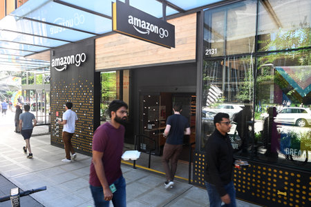 Seattle, WA, USA - August 3, 2023: People near the Amazon Go store in Seattle.