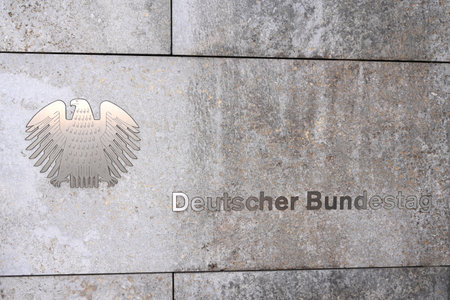 Berlin, Germany - November 03, 2022: The German Bundestag (Deutscher Bundestag) logo on Eingang WilhelmstraÃe buildingのeditorial素材