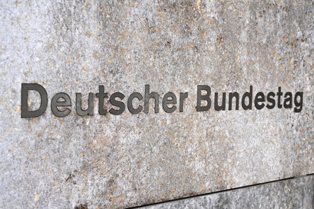 Berlin, Germany - November 03, 2022: The German Bundestag (Deutscher Bundestag) logo on Eingang WilhelmstraÃe buildingのeditorial素材
