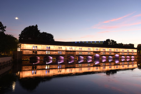 Barrage Vauban, or Vauban Dam bridge at night in Strasbourg, France.の写真素材
