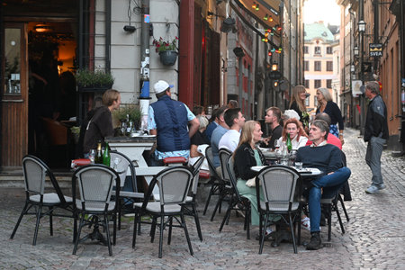 Stockholm, Sweden - July 29, 2024: A people rest in cafe in the old town of Stockholm.のeditorial素材