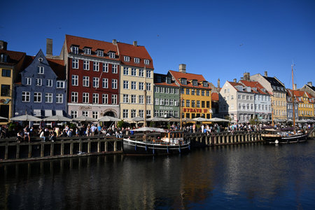 Copenhagen, Denmark - July 31, 2024: New Harbour (Nyhavn) is a 17th-century waterfront, canal and entertainment district in Copenhagen, Denmark.のeditorial素材