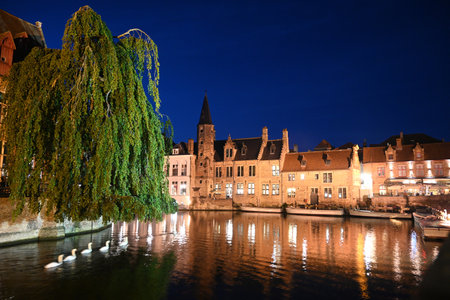 Bruges (Brugge), Belgium. Old town of Bruges, Belgium. Bruges cityscape with medieval houses at nigt.の写真素材