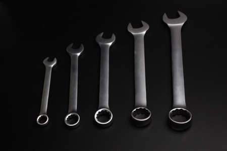 The wrench steel tools for repair on black background.