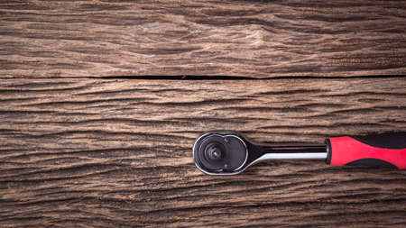 Working tools on wooden table background close up