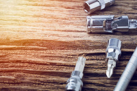 Working tools on wooden table background close up