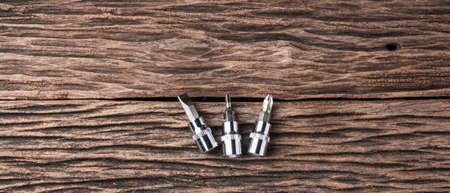 working tools on wooden table background close up,color effect