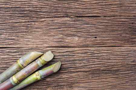 Close up sugarcane on wood background close up