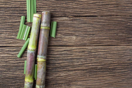 Close up sugarcane on wood background close upの写真素材