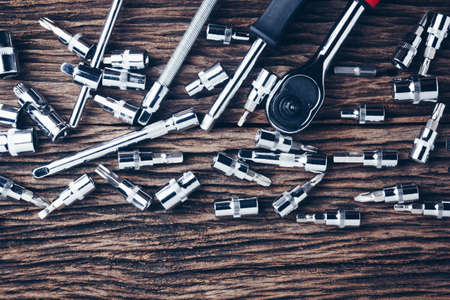 working tools on wooden background. color effect.