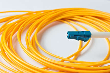 Macro Fiber optic patchcord LC on white backgroundの写真素材