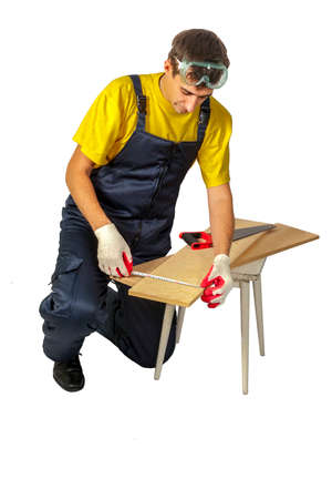 Isolate the man in the yellow shirt in overalls makes meteringの写真素材