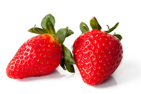 Red ripe strawberries isolated on white backgroundの写真素材